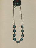 Turquoise and silver necklace and earrings